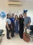 Membros da equipe de radioterapia do Hospital Unimed Bauru, a mdica Tatiana Taba e os cantores jovens evanglicos