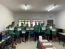 Colaboradores da Unimed Bauru na formatura do Programa Flix, com os alunos do Projeto Seara de Luz