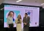 Cristina recebe a premio do vice-presidente da Unimed do Brasil,  Emilson Ferreira Lorca (esquerda) e do gerente de Controladoria da Unimed do Brasil, Jos Carlos da Silva Jnior