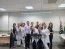 aparece ao centro o representante da Medtronic Fbio Neubern e ao redor as equipes dos setores de endoscopia, Ncleo de Segurana do Paciente e Educao continuada.