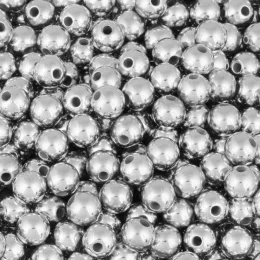 perola abs com furo 5gr 6 dourado.jpg