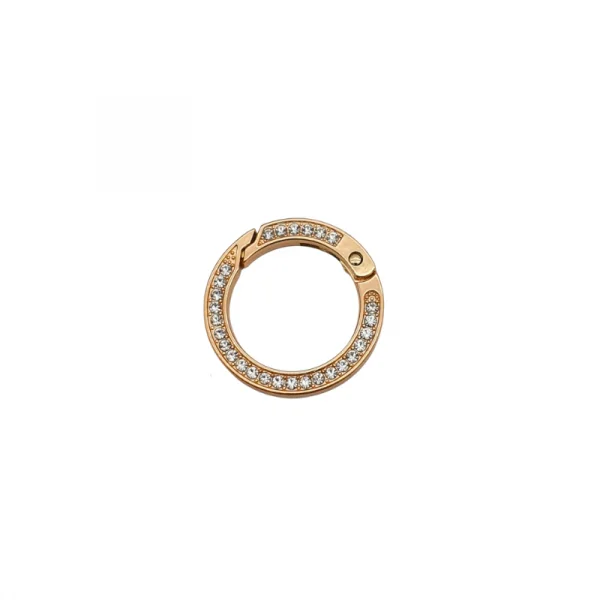 argola articulada com strass dourado.png