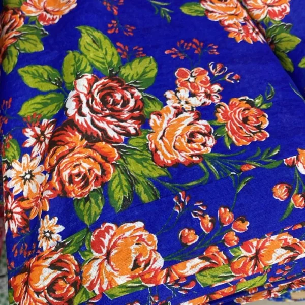 tecido chita fundo azul flor laranja.jpg