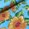 Chita Flex floral laranja fundo azul claro 135.png