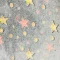 Tecido malha soft glow estrela colorida.png
