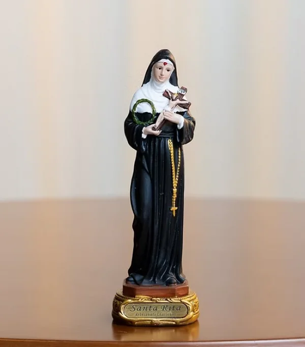Santa Rita 13cm � Resina
