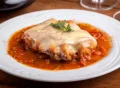 Contra filé à parmegiana Contra filé à parmegiana