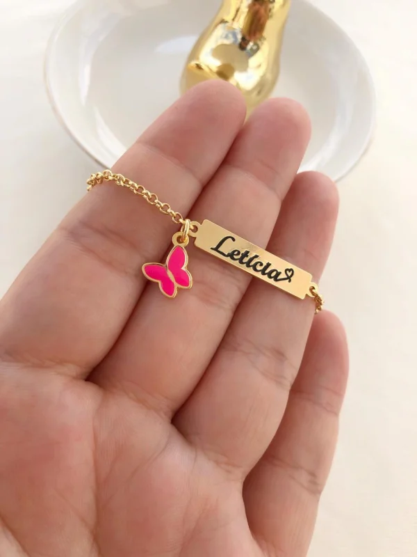 Pulseira infantil Placa com nome e borboleta rosa - Banhado a Prata
