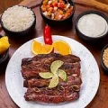 Kit Carne: Assado de Tiras Angus + Acompanhamentos da Casa